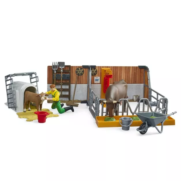 Étable pour vaches et veaux avec agriculteur, vache et veau